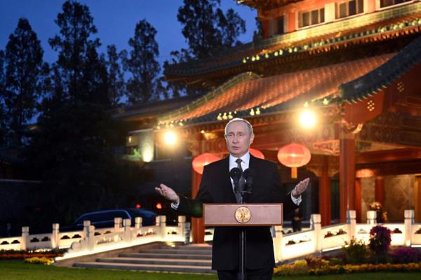 Russian President Putin attends a press co<em></em>nference in Beijing