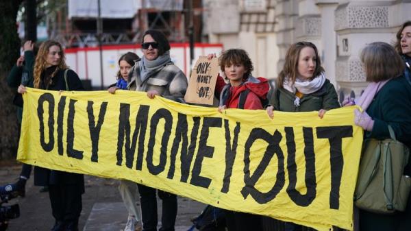 Greenpeace activists outside Westminster Magistrates' Court, London, where environmental campaigner Greta Thunberg is due to appear