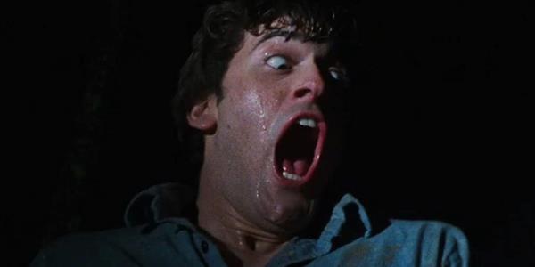 Ash looking scared in The Evil Dead
