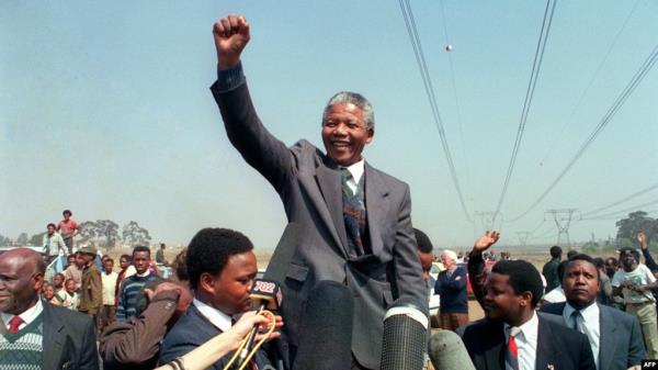 FILE - Anti-apartheid leader and African Natio<em></em>nal Co<em></em>ngress member Nelson Mandela on Sept. 5, 1990. Mandela has been seen as a moral compass in South Africa, but 10 years after his death some are questio<em></em>ning the state of the country today.
