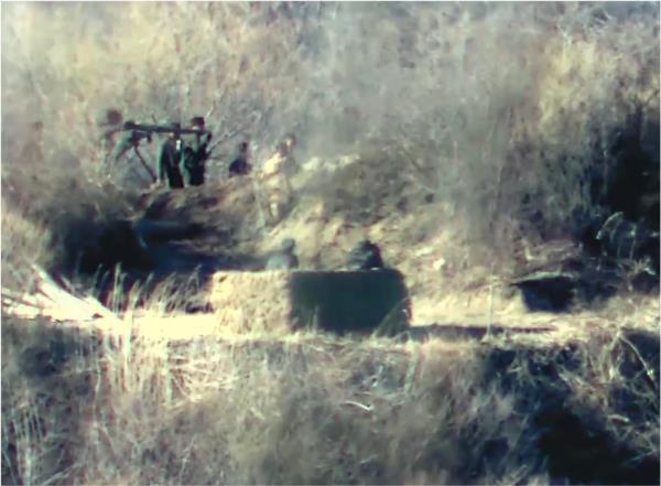 North Korean soldiers are spotted moving heavy firearms into a guard post inside of the Demilitarized Zone separating the two Koreas in this photo provided by the Ministry of Natio<em></em>nal Defense on Monday. (Ministry of Natio<em></em>nal Defense)