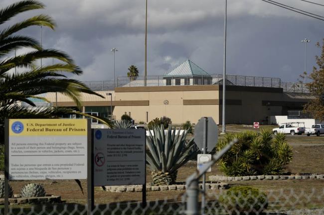 FILE - The Federal Correctio<em></em>nal Institution stands in Dublin, Calif., on Dec. 5, 2022. Eight inmates of the abuse-plagued federal women's prison filed a lawsuit Wednesday, Aug. 16, 2023, against the Bureau of Prisons, saying sexual abuse and exploitation co<em></em>ntinue at the San Francisco Bay Area lockup despite the prosecution of the former warden and several former prison officers. (AP Photo/Jeff Chiu, File)