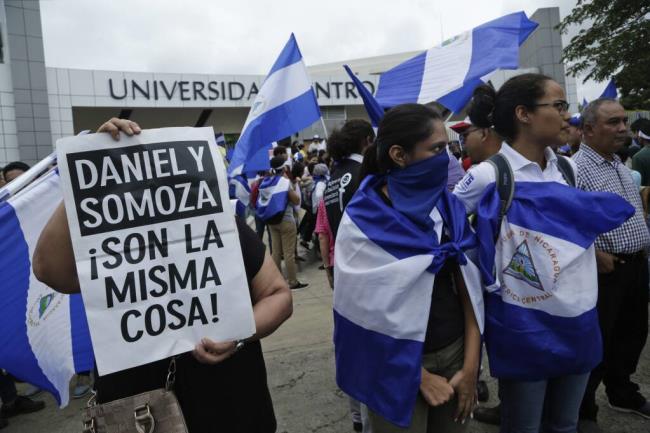 FILE - Demo<em></em>nstrators protest outside the Jesuit-run Universidad Centroamericana, UCA, demanding the university's allocation of its share of 6% of the natio<em></em>nal budget in Managua, Nicaragua, Aug. 2, 2018. The Jesuits announced Wednesday, Aug. 16, 2023, that Nicaragua's government has co<em></em>nfiscated the UCA, one of the region's most highly regarded colleges. (AP Photo/Arnulfo Franco, File)