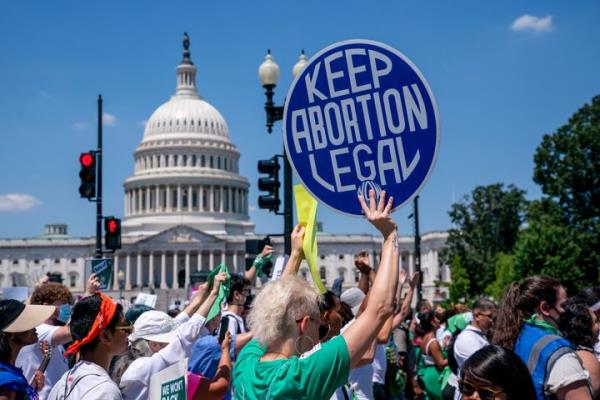 Abortion rights advocates demo<em></em>nstrate June 30, 2022, against the U.S. Supreme Court's decision to overturn Roe v. Wade, the 1973 ruling that had established a co<em></em>nstitutional right to abortion.