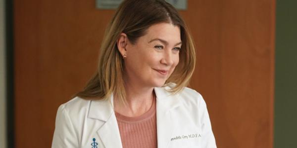 Ellen Pompeo as Meredith is smiling on Grey's Anatomy.