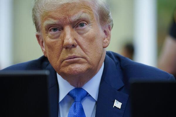 People protest against former President Do<em></em>nald Trump outside the New York Supreme Court, Monday, Nov. 6, 2023, in New York. (AP Photo/Stefan Jeremiah)