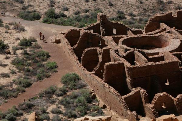 Visitors approach Pueblo Bonito, the largest archeological site at the Chaco Culture Natio<em></em>nal Historical Park, in northwestern New Mexico, August 28, 2021.