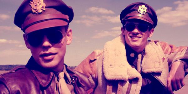 Austin Butler sitting inside a plane and looking sideways in Masters of the Air