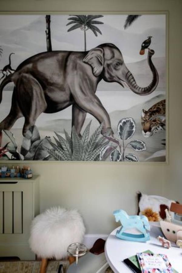 The artwork in the children's playroom is a scene from a wallpaper mural called 'Wild India Caravan'. The graphics team at Les Dominotiers in France included the animals the children loved. 