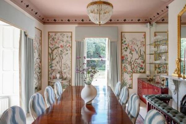 The wall covering with panels in the dining room is Tian by Gucci. The table was sourced from The Store Yard.