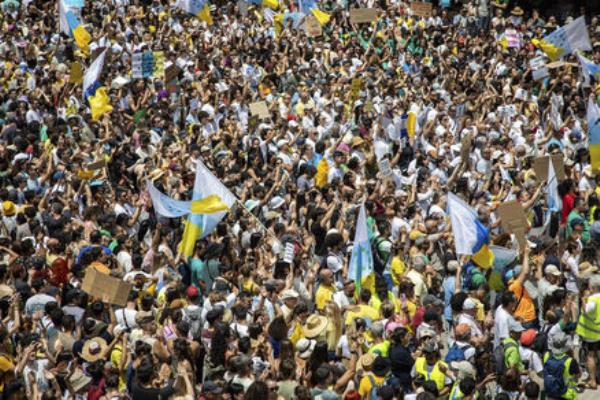 People gather during a mass demo<em></em>nstration against over tourism which affects the local population with inaccessible housing among other things in Las Palmas de Gran Canaria, Spain, Saturday April 20, 2024. Picture: Europa Press via AP People gather during a mass demo<em></em>nstration against over tourism which affects the local population with inaccessible housing among other things in Las Palmas de Gran Canaria, Spain, Saturday April 20, 2024. Picture: Europa Press via AP