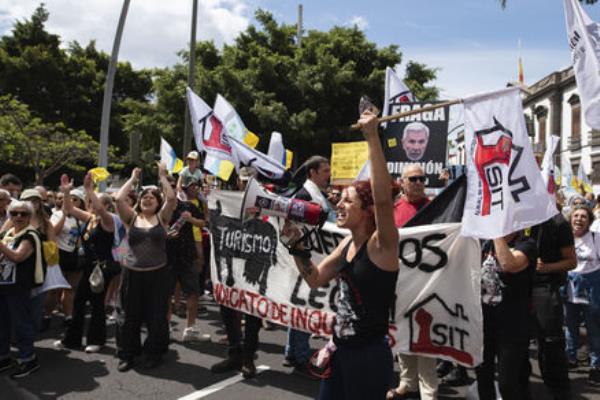People march during a mass demo<em></em>nstration against over tourism which affects the local population with inaccessible housing among other things in Santa Cruz de Tenerife, Spain, Saturday, April 20, 2024. Picture: AP Photo/Miguel Velasco Almendral People march during a mass demo<em></em>nstration against over tourism which affects the local population with inaccessible housing among other things in Santa Cruz de Tenerife, Spain, Saturday, April 20, 2024. Picture: AP Photo/Miguel Velasco Almendral