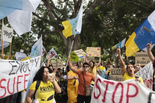 People march during a mass demo<em></em>nstration against over tourism, which affects the local population with inaccessible housing, among other things, in Santa Cruz de Tenerife, Spain, Saturday, April 20, 2024. Picture: AP Photo/Miguel Velasco Almendral People march during a mass demo<em></em>nstration against over tourism, which affects the local population with inaccessible housing, among other things, in Santa Cruz de Tenerife, Spain, Saturday, April 20, 2024. Picture: AP Photo/Miguel Velasco Almendral
