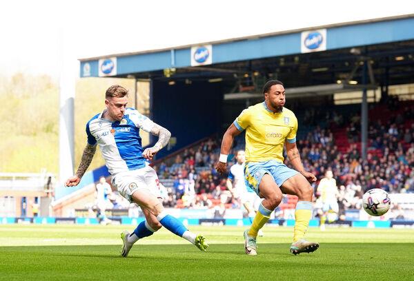 Blackburn Rovers' Sammie Szmodics (left) scores their side's first goal of the game during the Sky Bet Champio<em></em>nship match at Ewood Park, Blackburn. Picture date: Sunday April 21, 2024. PA Photo. See PA story SOCCER Blackburn. Photo credit: Martin Rickett/PA Wire.