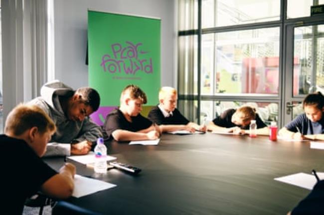 Marcus Rashford in the classroom for Football Beyond Borders