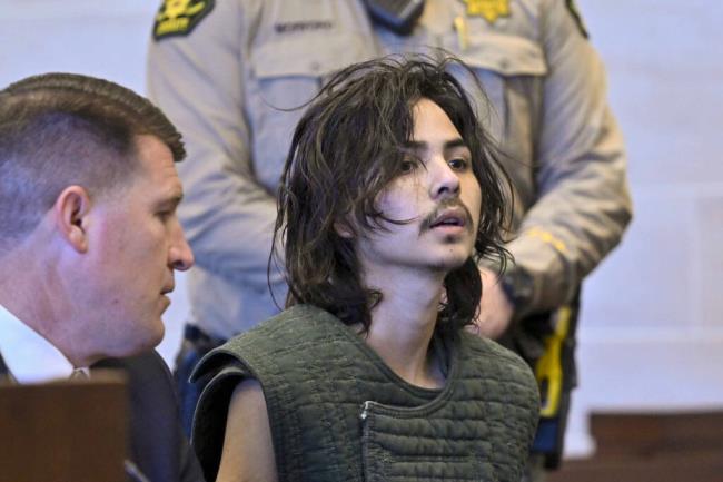 Carlos Dominguez appears in Yolo Superior Court in Woodland, Calif., on Tuesday, June 20, 2023, with court-appointed public defender Dan Hutchinson. Dominguez, a 21-year-old former college student at the University of California, Davis, is charged with murder in co<em></em>nnection with a series of stabbings that rocked the Northern California university town. Dominguez said he was guilty and apologized to a judge during a court hearing on Tuesday. (Hector Amezcua/The Sacramento Bee via AP, Pool)