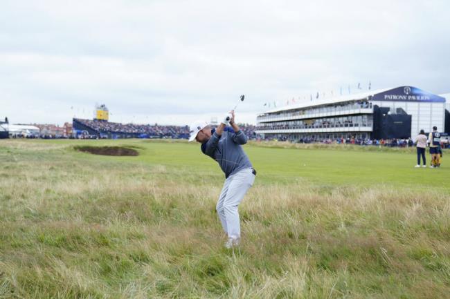 Brian Harman plays his second shot to the 18th green Saturday during the British Open at the Royal Liverpool Golf Club in Hoylake, England. (Jon Super / ASSOCIATED PRESS)