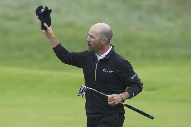 United States' Brian Harman celebrates on the 18th green after winning the British Open Golf Champio<em></em>nships at the Royal Liverpool Golf Club in Hoylake, England, Sunday, July 23, 2023. (AP Photo/Kin Cheung)
