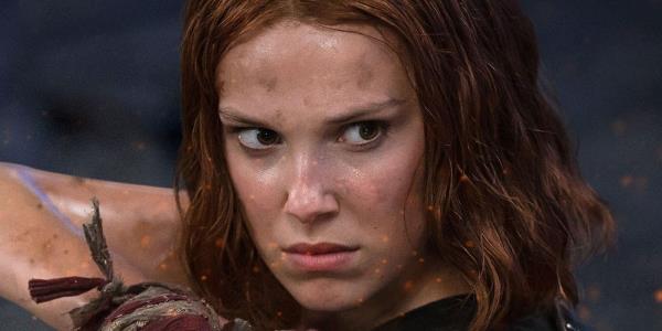 Millie Bobby Brown staring intensely in Damsel