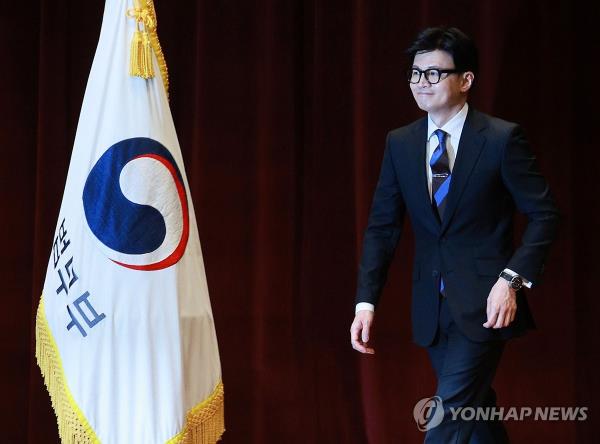 Justice Minister Han Dong-hoon leaves the stage after delivering a speech during a farewell ceremony at the ministry building in Gwacheon, just south of Seoul, on Dec. 21, 2023. He resigned from the post to take over as the interim leader of the ruling People Power Party.