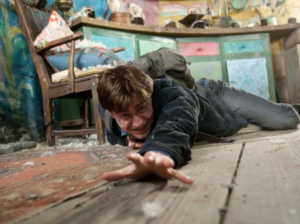 In this film publicity image released by Warner Bros. Pictures, Daniel Radcliffe is shown in a scene from 