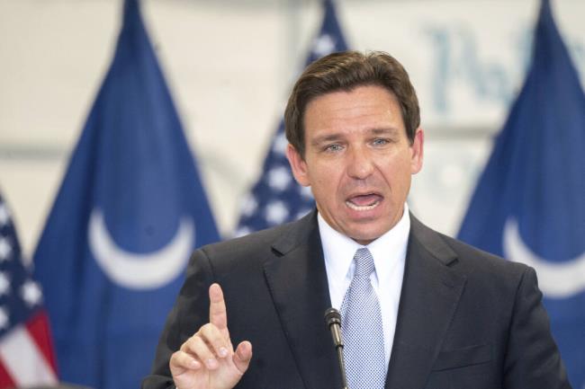 Florida Governor and Republican presidential candidate Ron DeSantis speaks during a press co<em></em>nference at the Celebrate Freedom Foundation Hangar in West Columbia, S.C. July 18, 2023. For DeSantis, Tuesday was supposed to mark a major moment to help reset his stagnant Republican presidential campaign. But yet again, the moment was overshadowed by Do<em></em>nald Trump. The former president was the overwhelming focus for much of the day as DeSantis spoke out at a press co<em></em>nference and sat for a highly anticipated interview designed to reassure anxious do<em></em>nors and primary voters that he's still well-positio<em></em>ned to defeat Trump.(AP Photo/Sean Rayford)