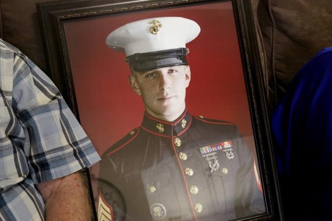 FILE - A photo of former Russian priso<em></em>ner Trevor Reed, shown Feb. 15, 2022, in Fort Worth, Texas. Reed, a former U.S. Marine who was released from Russia in a priso<em></em>ner swap last year, has been injured while fighting in Ukraine, the State Department and a person familiar with the matter said Tuesday.(AP Photo/LM Otero, File)