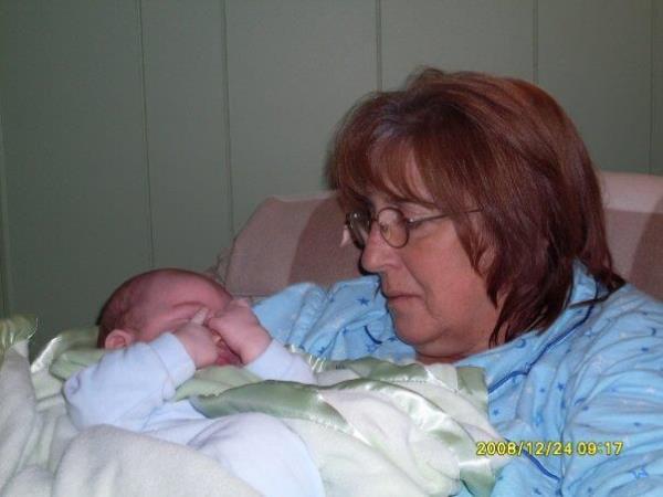 Krystal's aunt with Krystal's newborn son.