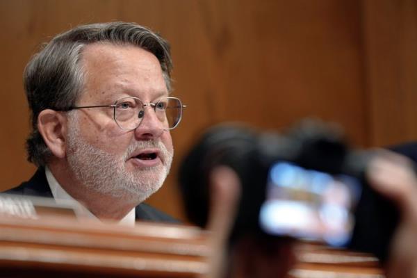Senate Homeland Security and Government Affairs Chairman Gary Peters, D-Mich., questions Homeland Security Secretary Alejandro Mayorkas during the FY2024 budget hearing for DHS on Tuesday, April 18, 2023, on Capitol Hill in Washington.