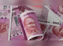 Rupee matches record closing low as dollar bids persist