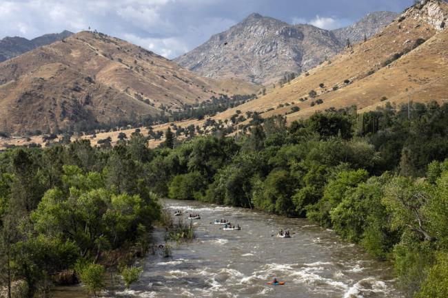 FILES — Rafters on the Kern River in Kernville, Calif., on May 5, 2023. Melt water from the snowpack that piled up in the Sierra Nevada over a stormy winter has turned normally tame rivers into deadly, raging torrents. (Mette Lampcov/The New York Times)