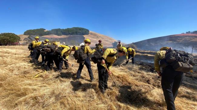 Ground crews respond to the scene of the San Anto<em></em>nio Fire that burned a<em></em>bout 38 acres before its forward progression was stopped June 30, 2023, in a rural part of Petaluma. (Kent Porter / The Press Democrat)
