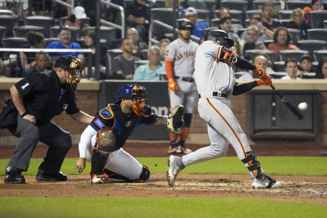 San Francisco Giants' Patrick Bailey, right, hits a three-run home run during the eighth inning of a ba<em></em>seball game against the New York Mets, Friday, June 30, 2023, in New York. (AP Photo/Mary Altaffer)